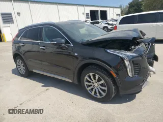 2021 Cadillac XT4 FWD Premium Luxury z VIN 1GYFZCR48MF002468, wystawiony jako Copart lot #50878955 z przebiegiem 76 034 mil mil oraz Szkoda całkowita • Salvage title. Historia ofert i sprzedaży dostępna na DreamBid. Obrazek 4.
