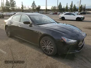 2021 Maserati Ghibli with VIN ZAM57XSA5M1369156, listed as a Copart auction lot 82876193 with 19,415 mi miles. Bid and sale history available at carsss.com. Image 4.