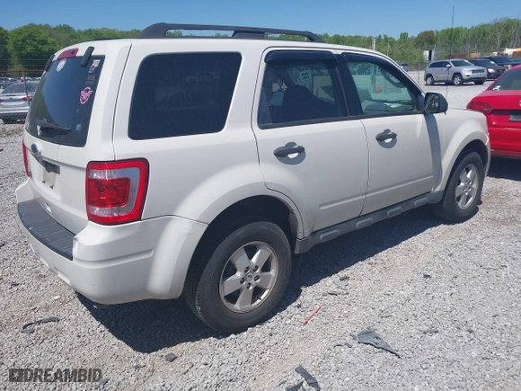 2010 Ford Escape XLT with VIN 1FMCU0D74AKC67975, listed as a IAAI auction lot 41996023 with 199,626 mi miles. Bid and sale history available at carsss.com. Image 4.