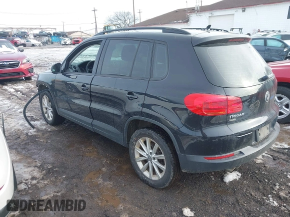 2017 Volkswagen Tiguan S with VIN WVGBV7AX7HK047973, listed as a IAAI auction lot 41197329 with 92,960 mi miles and . Bid and sale history available at DreamBid. Image 3.