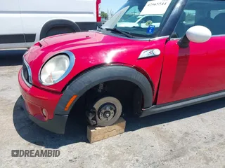 2009 MINI Hardtop S with VIN WMWMF73529TW84638, listed as a IAAI auction lot 42565544 with 60,721 mi miles and . Bid and sale history available at DreamBid. Image 6.