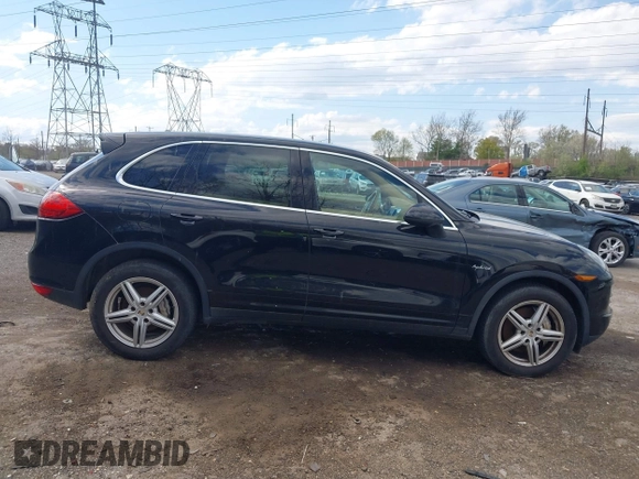 2011 Porsche Cayenne S Hybrid with VIN WP1AE2A27BLA91799, listed as a IAAI auction lot 42035613 with 131,480 mi miles. Bid and sale history available at carsss.com. Image 13.