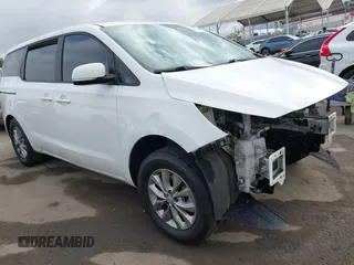 2016 Kia Sedona L with VIN KNDMA5C12G6151168, listed as a IAAI auction lot 42117087 with 99,743 mi miles. Bid and sale history available at carsss.com. Image 1.