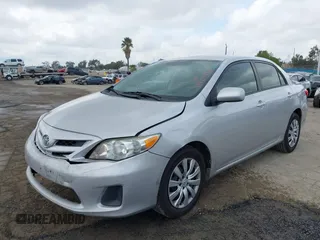 2012 Toyota Corolla L with VIN 2T1BU4EE9CC803165, listed as a IAAI auction lot 41924436 with 257,724 mi miles. Bid and sale history available at carsss.com. Image 20.