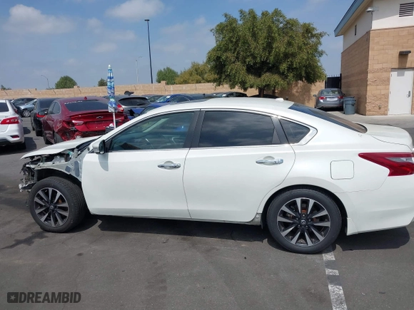2018 Nissan Altima 2.5 SV with VIN 1N4AL3AP4JC186544, listed as a IAAI auction lot 41892390 with 113,384 mi miles. Bid and sale history available at carsss.com. Image 15.