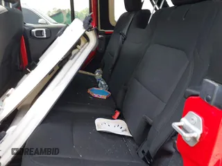 2020 Jeep Wrangler Unlimited Sport S with VIN 1C4HJXDN8LW122928, listed as a IAAI auction lot 42430099 with 58,454 mi miles and . Bid and sale history available at DreamBid. Image 8.