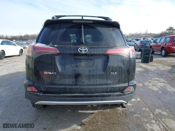2016 Toyota RAV4 XLE with VIN 2T3WFREV7GW255784, listed as a IAAI auction lot 41266085 with 87,426 mi miles. Bid and sale history available at carsss.com. Image 16.