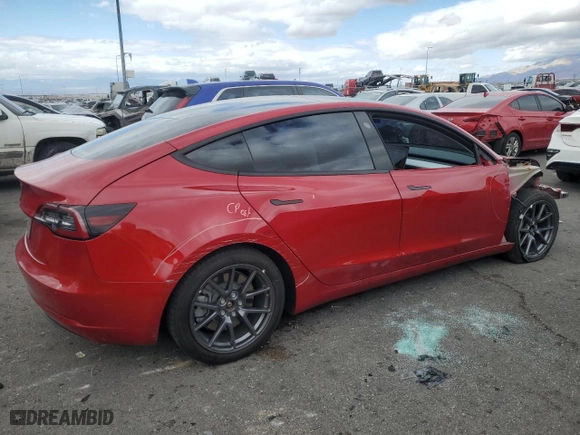 2021 Tesla Model 3 Standard Range Plus with VIN 5YJ3E1EA8MF978257, listed as a Copart auction lot 48592605 with 84,710 mi miles and Salvage Title. Bid and sale history available at carsss.com. Image 3.