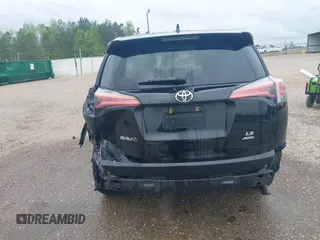 2018 Toyota RAV4 LE with VIN 2T3BFREV8JW777510, listed as a IAAI auction lot 41974675 with 62,795 mi miles. Bid and sale history available at carsss.com. Image 6.