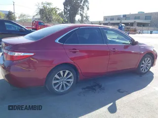 2017 Toyota Camry Hybrid LE with VIN 4T1BD1FK7HU215080, listed as a IAAI auction lot 41959340 with 173,392 mi miles. Bid and sale history available at carsss.com. Image 4.
