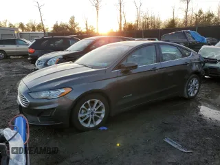 2019 Ford Fusion Hybrid SE with VIN 3FA6P0LU7KR243690, listed as a Copart auction lot 71983342 with 52,562 mi miles. Bid and sale history available at carsss.com. Image 1.