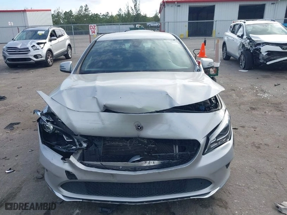 2019 Mercedes-Benz CLA with VIN WDDSJ4EB2KN743990, listed as a IAAI auction lot 41282368 with 72,364 mi miles. Bid and sale history available at carsss.com. Image 12.