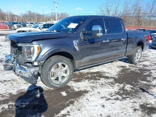 2021 Ford F-150 XL with VIN 1FTFW1ED4MFB70925, listed as a IAAI auction lot 41269509 with 113,805 mi miles. Bid and sale history available at carsss.com. Image 2.