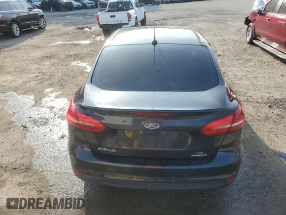 2015 Ford Focus SE with VIN 1FADP3F20FL257194, listed as a Copart auction lot 44021095 with 153,600 mi miles and Salvage Title. Bid and sale history available at carsss.com. Image 6.