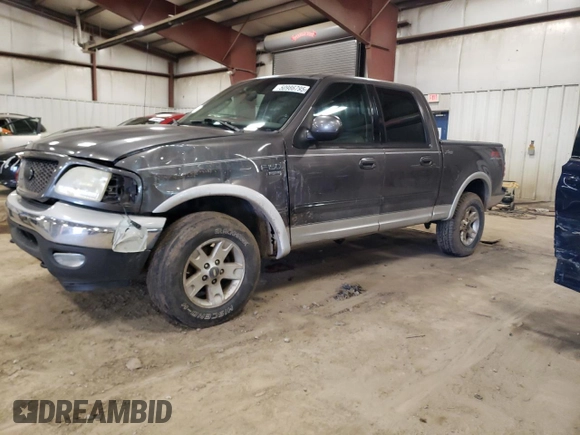 2002 Ford F-150 XLT with VIN 1FTRW08L92KD19411, listed as a Copart auction lot 50986795 with 164,556 mi miles and Clean Title. Bid and sale history available at carsss.com. Image 1.