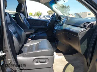 2008 Honda Odyssey Touring with VIN 5FNRL38948B116432, listed as a IAAI auction lot 42162566 with 121,996 mi miles. Bid and sale history available at carsss.com. Image 5.