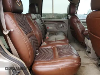 2000 Cadillac Escalade z VIN 1GYEK63R9YR218680, wystawiony jako Copart lot #87393204 z przebiegiem 295 494 mil mil oraz Szkoda całkowita • Salvage title. Historia ofert i sprzedaży dostępna na DreamBid. Obrazek 10.