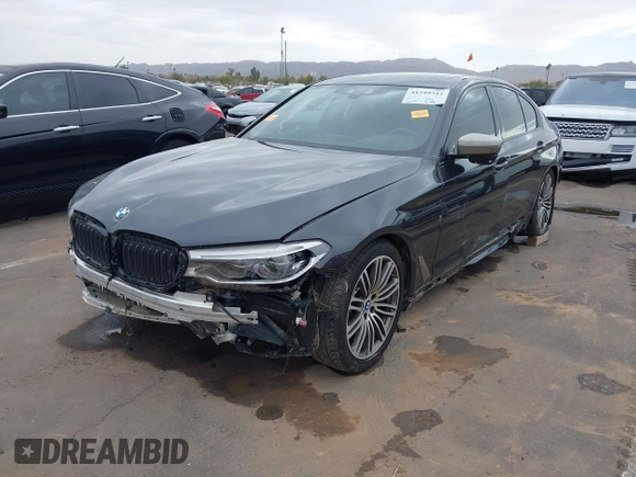 2019 BMW 5 Series M550i xDrive with VIN WBAJB9C51KB287797, listed as a IAAI auction lot 41549311 with 61,459 mi miles and . Bid and sale history available at DreamBid. Image 6.