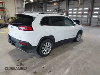 2015 Jeep Cherokee Limited with VIN 1C4PJMDS3FW728884, listed as a IAAI auction lot 41973663 with 112,719 mi miles. Bid and sale history available at carsss.com. Image 4.