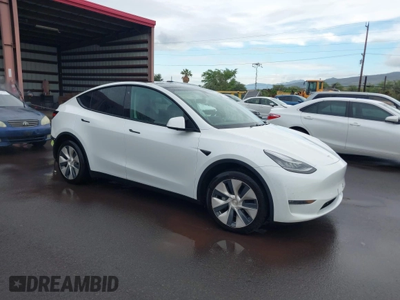 2020 Tesla Model Y Long Range z VIN 5YJYGDEE3LF043800, wystawiony jako IAAI lot #41590220 z przebiegiem 62 341 mil mil oraz . Historia ofert i sprzedaży dostępna na DreamBid. Obrazek 1.