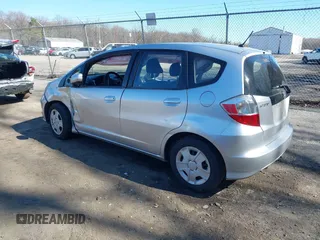 2013 Honda Fit with VIN JHMGE8H38DC048569, listed as a IAAI auction lot 41898777 with 130,461 mi miles. Bid and sale history available at carsss.com. Image 3.