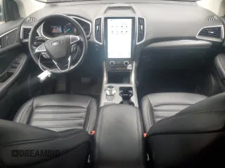 2021 Ford Edge SEL z VIN 2FMPK3J98MBA50555, wystawiony jako Copart lot #58509445 z przebiegiem 114 188 mil mil oraz Czysty tytuł • Clean title. Historia ofert i sprzedaży dostępna na DreamBid. Obrazek 8.