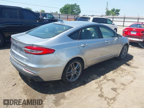 2020 Ford Fusion SEL with VIN 3FA6P0CDXLR196124, listed as a IAAI auction lot 42244231 with 99,306 mi miles and . Bid and sale history available at DreamBid. Image 4.