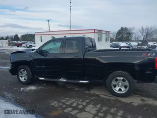 2018 Chevrolet Silverado 1500 LT with VIN 1GCVKREC1JZ349561, listed as a IAAI auction lot 41277292 with 102,525 mi miles. Bid and sale history available at carsss.com. Image 14.