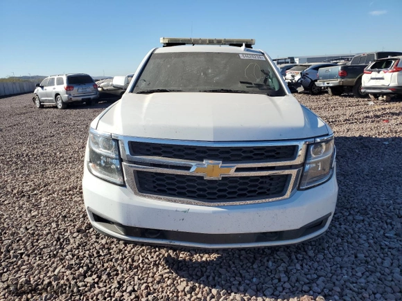 2016 Chevrolet Tahoe Commercial with VIN 1GNSKFEC2GR266027, listed as a Copart auction lot 84628234 with 135,689 mi miles and Salvage Title. Bid and sale history available at carsss.com. Image 5.