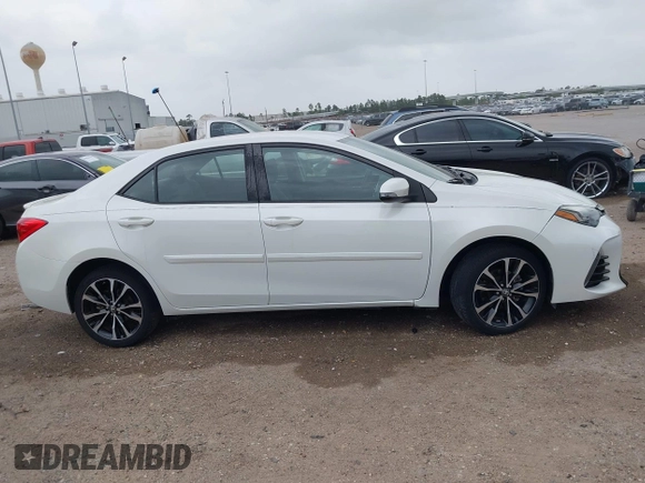 2019 Toyota Corolla L with VIN 5YFBURHE0KP875377, listed as a IAAI auction lot 41904405 with 73,604 mi miles and . Bid and sale history available at DreamBid. Image 13.