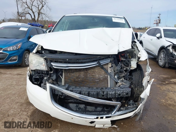 2013 Chrysler Town & Country Touring with VIN 2C4RC1BG3DR675173, listed as a IAAI auction lot 41744564 with 127,405 mi miles. Bid and sale history available at carsss.com. Image 12.