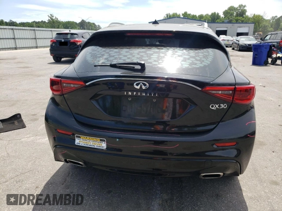 2019 Infiniti QX30 Luxe z VIN SJKCH5CP3KA007112, wystawiony jako Copart lot #56125065 z przebiegiem 122 788 mil mil oraz Szkody całkowita. Historia ofert i sprzedaży dostępna na DreamBid. Obrazek 6.