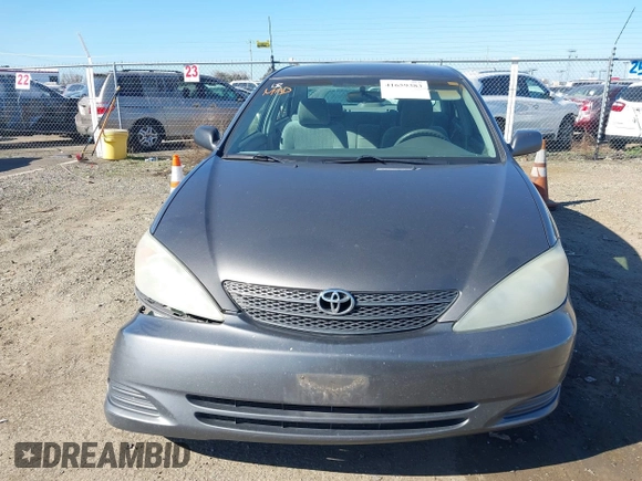 2004 Toyota Camry LE with VIN 4T1BF30K74U588368, listed as a IAAI auction lot 41659383 with 190,833 mi miles. Bid and sale history available at carsss.com. Image 6.