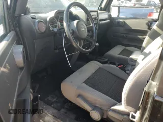 2010 Jeep Wrangler Rubicon with VIN 1J4BA6D10AL109001, listed as a Copart auction lot 69453954 with 137,821 mi miles and Salvage title. Bid and sale history available at DreamBid. Image 8.