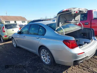 2014 BMW 7 Series 740i with VIN WBAYA6C54ED144450, listed as a IAAI auction lot 41680060 with 999,999 mi miles. Bid and sale history available at carsss.com. Image 13.