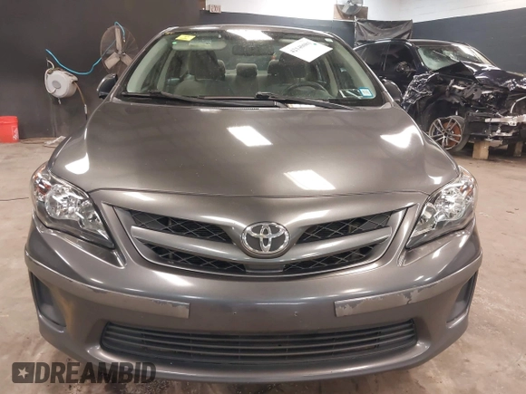 2011 Toyota Corolla L with VIN JTDBU4EE3BJ102060, listed as a IAAI auction lot 42140081 with 125,989 mi miles. Bid and sale history available at carsss.com. Image 12.