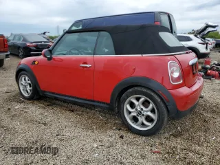 2012 MINI Convertible with VIN WMWZN3C58CT134224, listed as a Copart auction lot 57610015 with 141,394 mi miles and Salvage title. Bid and sale history available at DreamBid. Image 2.