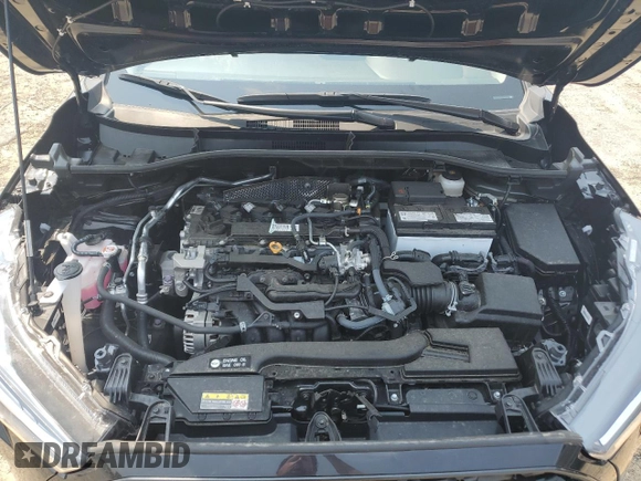 2024 Toyota Corolla Cross L with VIN 7MUAAAAG4RV097805, listed as a Copart auction lot 59846765 with 11,427 mi miles and Salvage title. Bid and sale history available at DreamBid. Image 12.