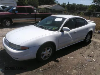 2000 Oldsmobile Alero GL2 z VIN 1G3NL52E4YC403539, wystawiony jako IAAI lot #42313033 z przebiegiem Nie podano mil oraz . Historia ofert i sprzedaży dostępna na DreamBid. Obrazek 2.