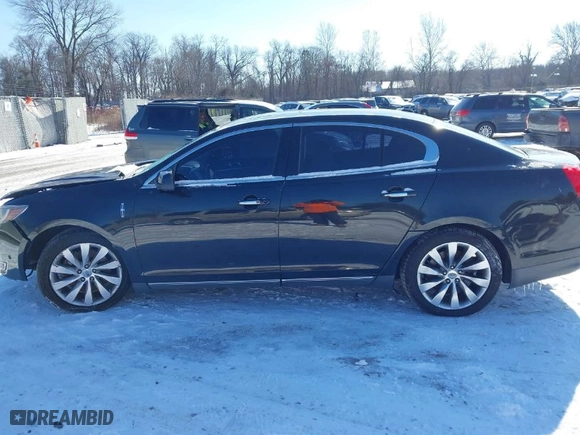 2014 Lincoln MKS with VIN 1LNHL9DK8EG600981, listed as a IAAI auction lot 41359187 with 158589 miles. Bid and sale history available at carsss.com. Image 14.