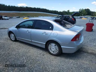 2006 Honda Civic z VIN JHMFA36246S007899, wystawiony jako Copart lot #58080595 z przebiegiem 222 699 mil mil oraz Szkoda całkowita • Salvage title. Historia ofert i sprzedaży dostępna na DreamBid. Obrazek 2.
