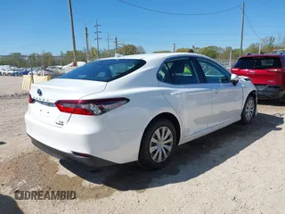 2021 Toyota Camry Hybrid LE with VIN 4T1C31AK2MU027513, listed as a IAAI auction lot 41856681 with 85,779 mi miles. Bid and sale history available at carsss.com. Image 4.