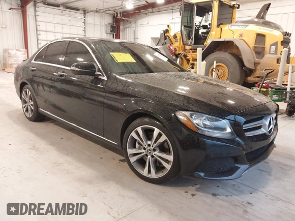2017 Mercedes-Benz C C 300 with VIN 55SWF4JB1HU219142, listed as a IAAI auction lot 41378244 with 85,799 mi miles. Bid and sale history available at carsss.com. Image 1.
