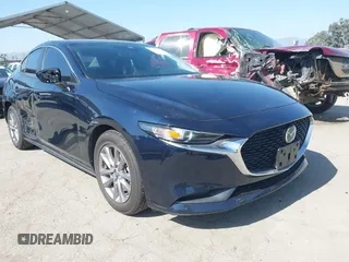 2021 Mazda 3 S with VIN JM1BPAAL8M1304440, listed as a IAAI auction lot 42510697 with 54,330 mi miles and . Bid and sale history available at DreamBid. Image 1.