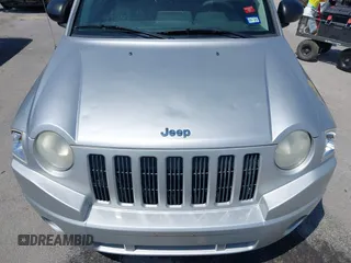 2008 Jeep Compass Sport with VIN 1J8FT47048D767281, listed as a IAAI auction lot 42010343 with 164,734 mi miles. Bid and sale history available at carsss.com. Image 6.