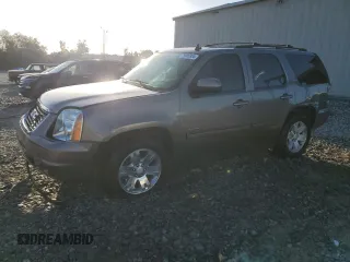 2011 GMC Yukon SLT with VIN 1GKS1CE05BR270876, listed as a Copart auction lot 75906934 with 215,964 mi miles and Salvage Title. Bid and sale history available at carsss.com. Image 1.