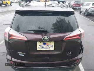 2018 Toyota RAV4 LE with VIN 2T3BFREV9JW857284, listed as a IAAI auction lot 42448480 with 85,551 mi miles and . Bid and sale history available at DreamBid. Image 16.