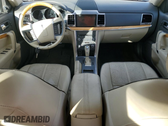 2012 Lincoln MKZ with VIN 3LNHL2JC0CR810906, listed as a Copart auction lot 84970434 with 98,277 mi miles and Salvage Title. Bid and sale history available at DreamBid. Image 7.