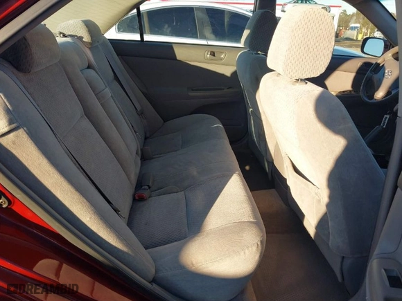 2004 Toyota Camry LE with VIN 4T1BF32K94U063857, listed as a IAAI auction lot 41253252 with 249,356 mi miles. Bid and sale history available at carsss.com. Image 8.