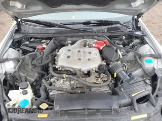 2005 Infiniti G35 with VIN JNKCV54E55M423348, listed as a IAAI auction lot 42195346 with 160,714 mi miles. Bid and sale history available at carsss.com. Image 10.